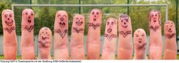 Eleven fingers with funny faces recreate the team photo of a soccer team