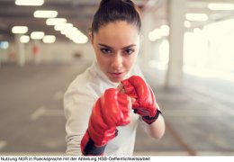 Young woman boxing in the gym