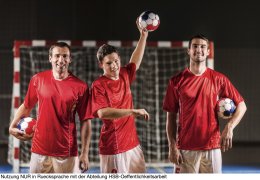 Three handball players.