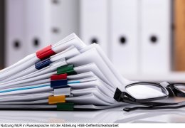 Stacked Documents And Eyeglasses