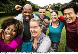 Group of cheerful diverse friends in the park