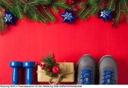 Christmas sport composition dumbbells sneakers branches concept healthy lifestyle